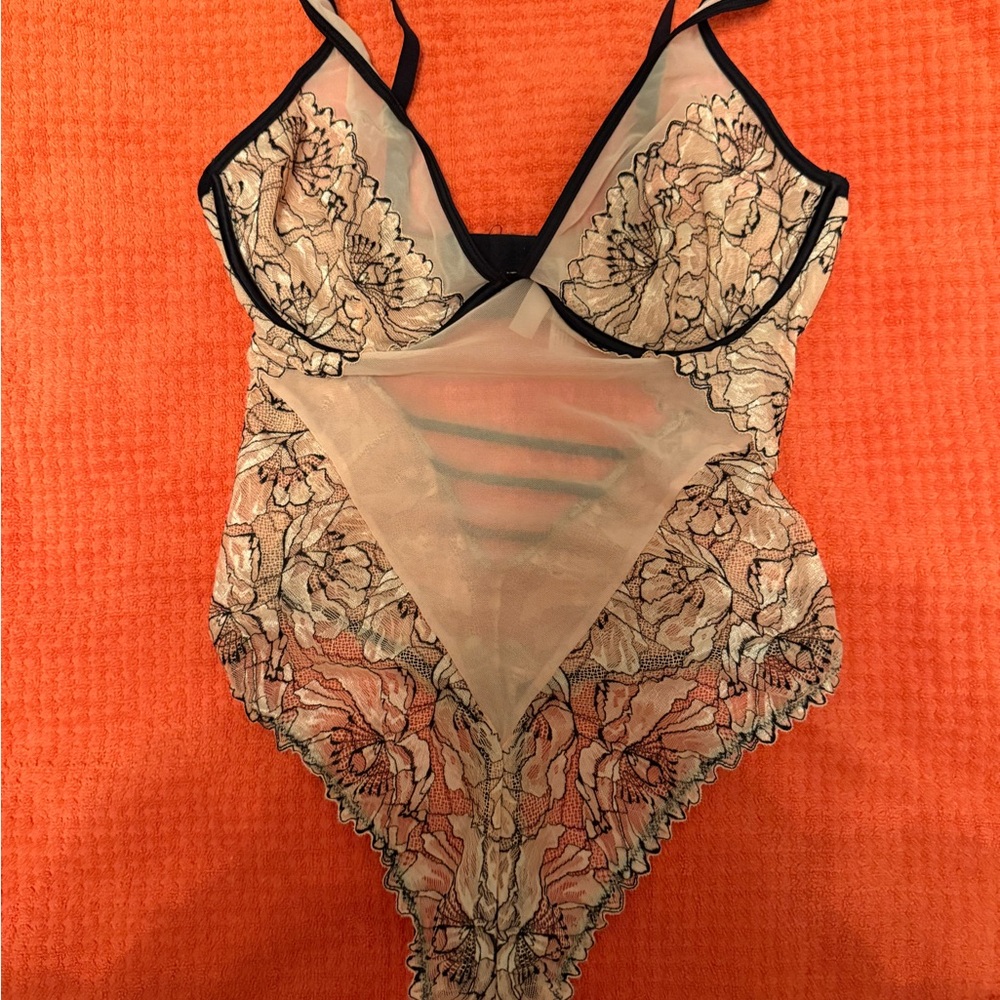 This is an Auden Women's Bodysuit with lace details